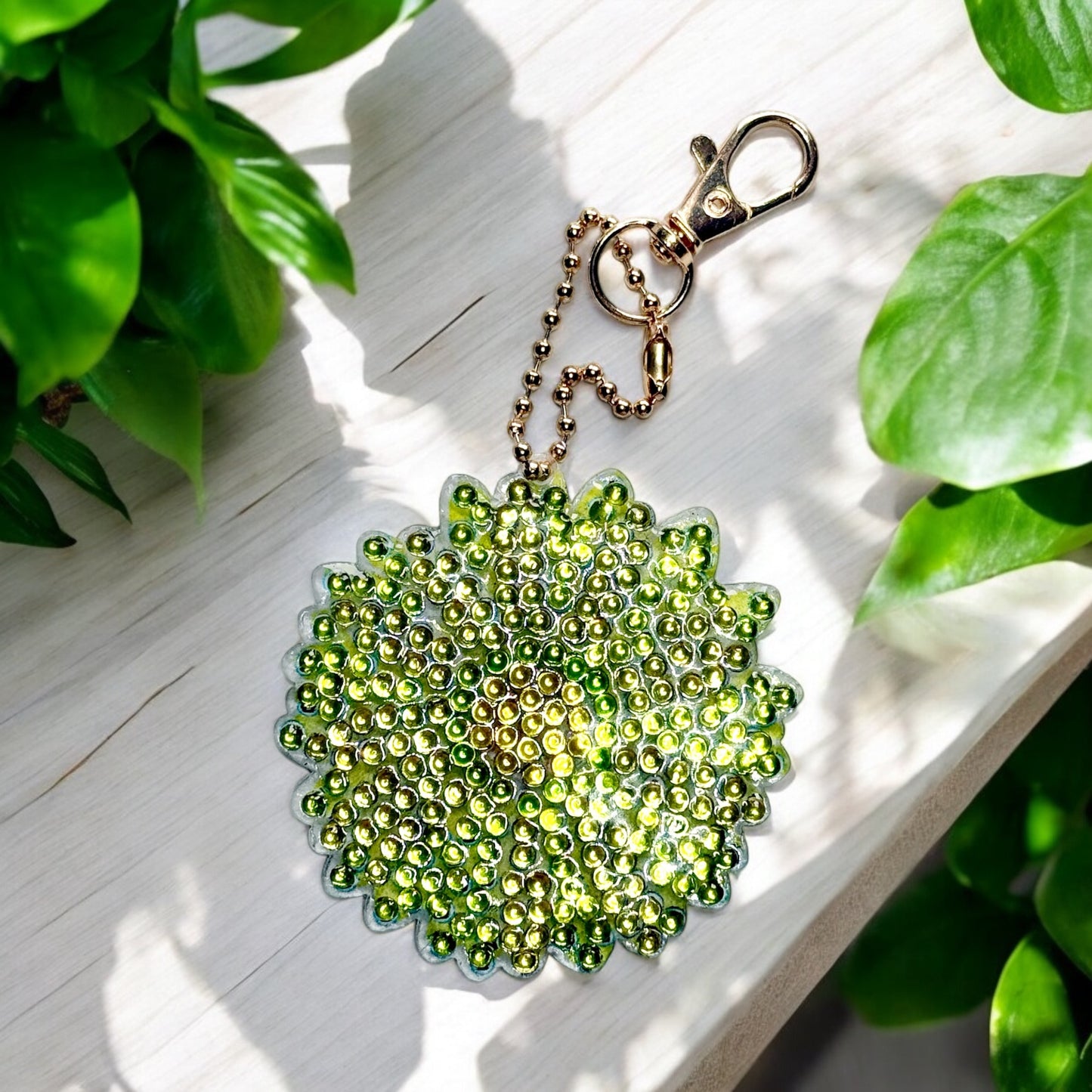 Sparkling keyring charm - green & gold